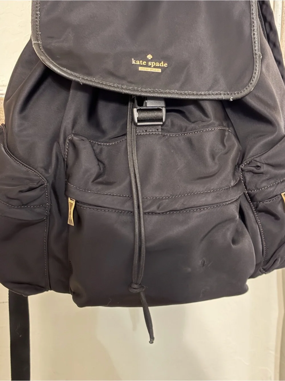 kate spade Black Nylon Drawstring Backpack with Gold Accents